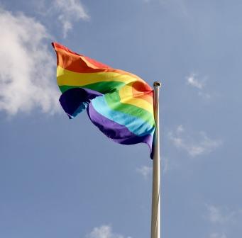 Graduation Student Unfurls Pride flag at Ceremony
