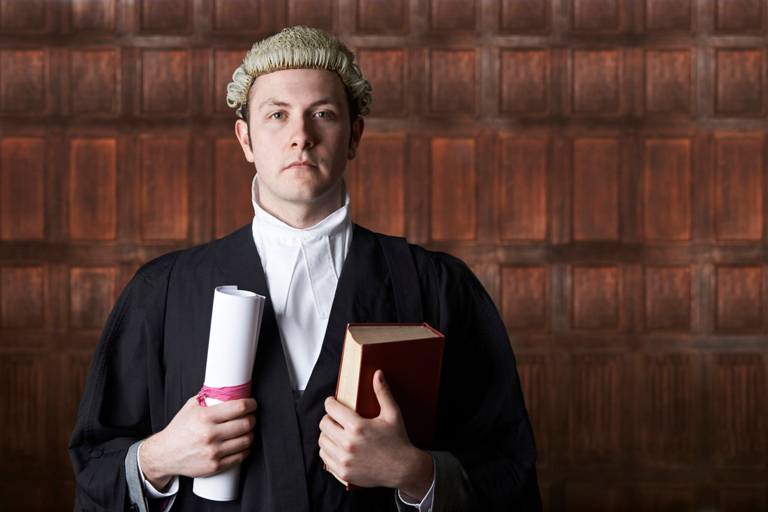 Why do barristers in England still wear wigs?